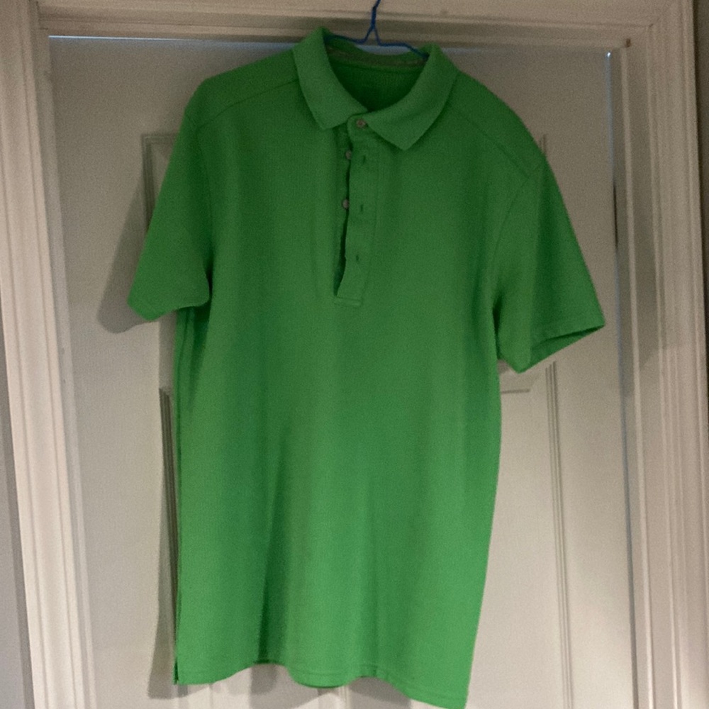 Large green polyester golf polo shirt.